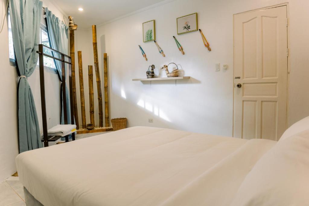 Postel nebo postele na pokoji v ubytování 8 Plus Beach Resort