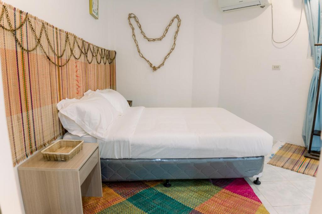 Postel nebo postele na pokoji v ubytování 8 Plus Beach Resort