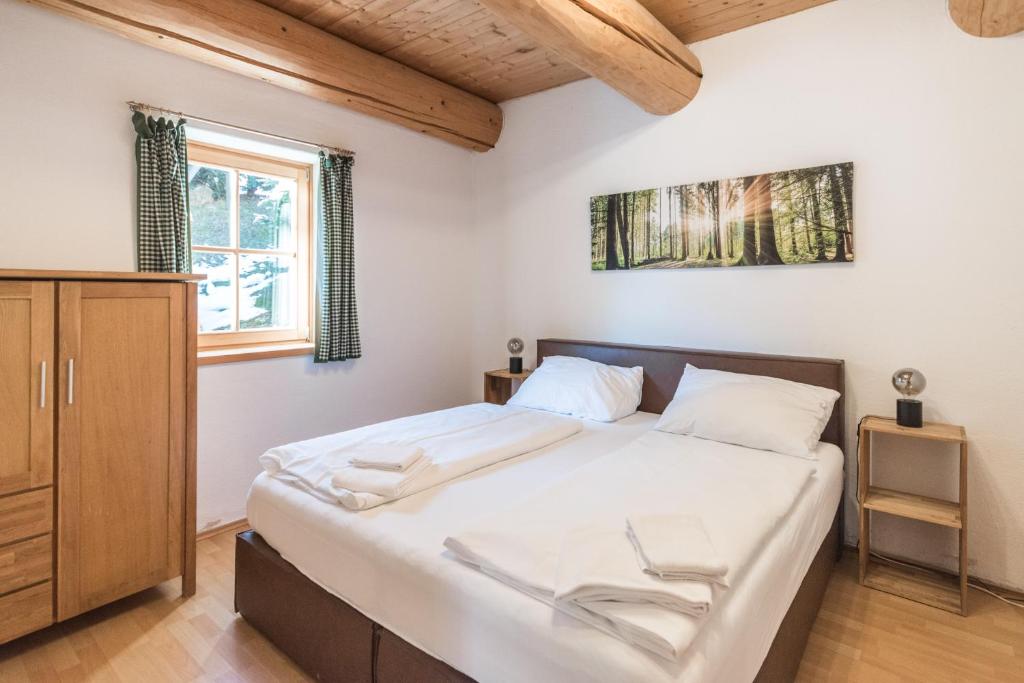 Posteľ alebo postele v izbe v ubytovaní Ski-N-Lake Chalet One