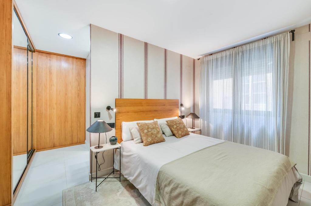 Posteľ alebo postele v izbe v ubytovaní Luxury Apartment Alcazaba by Nagoa Homes