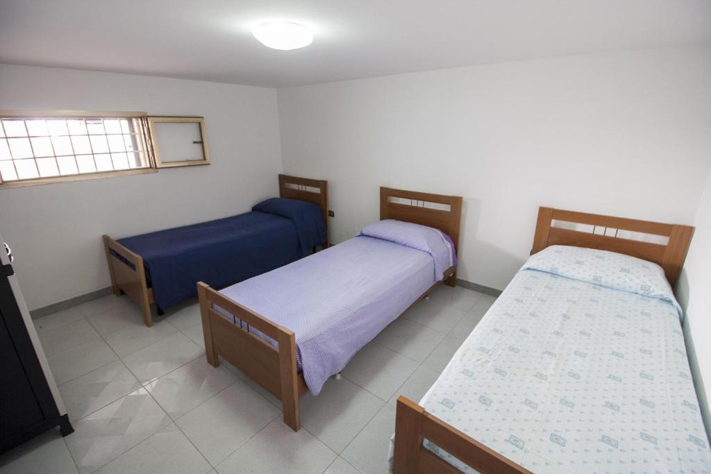 Postel nebo postele na pokoji v ubytování sax house