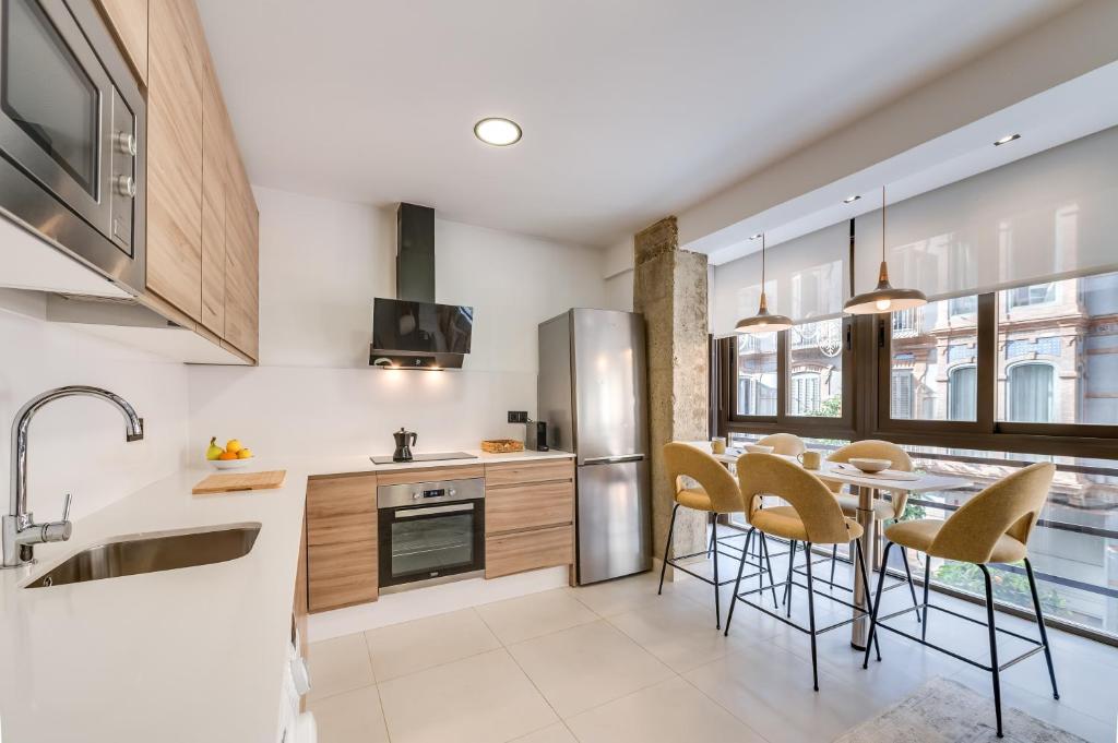 Kuchyňa alebo kuchynka v ubytovaní Luxury Apartment Alcazaba by Nagoa Homes