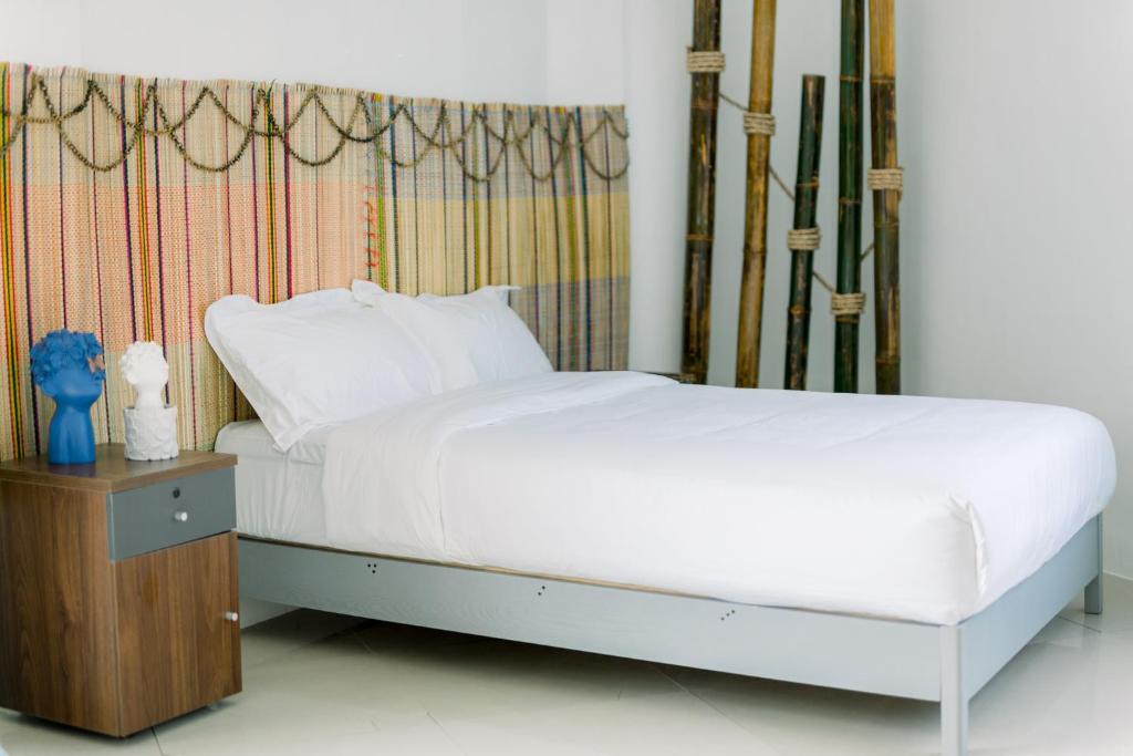 Postel nebo postele na pokoji v ubytování 8 Plus Beach Resort