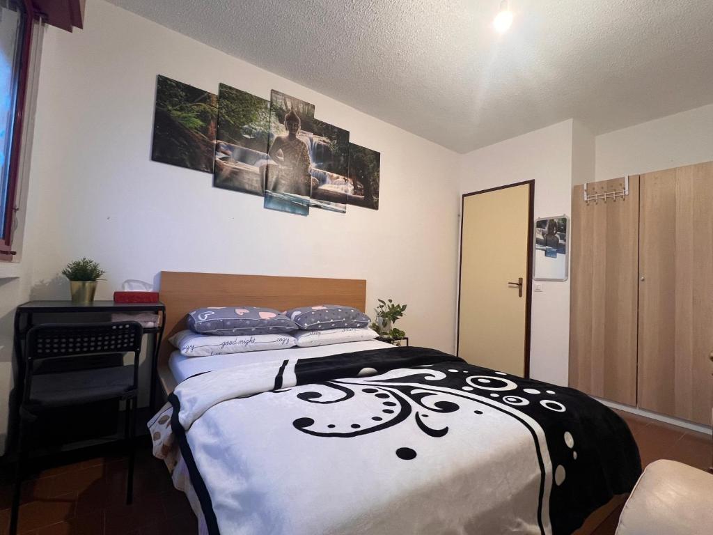 Postel nebo postele na pokoji v ubytování Ciao Brescia