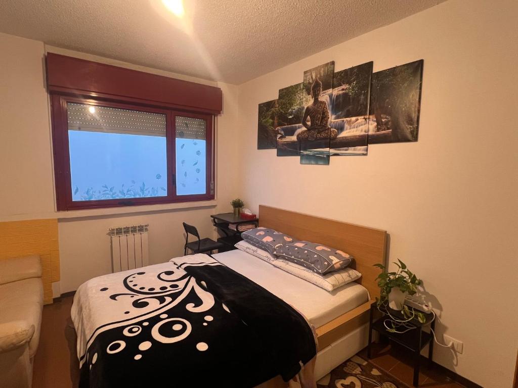 Postel nebo postele na pokoji v ubytování Ciao Brescia