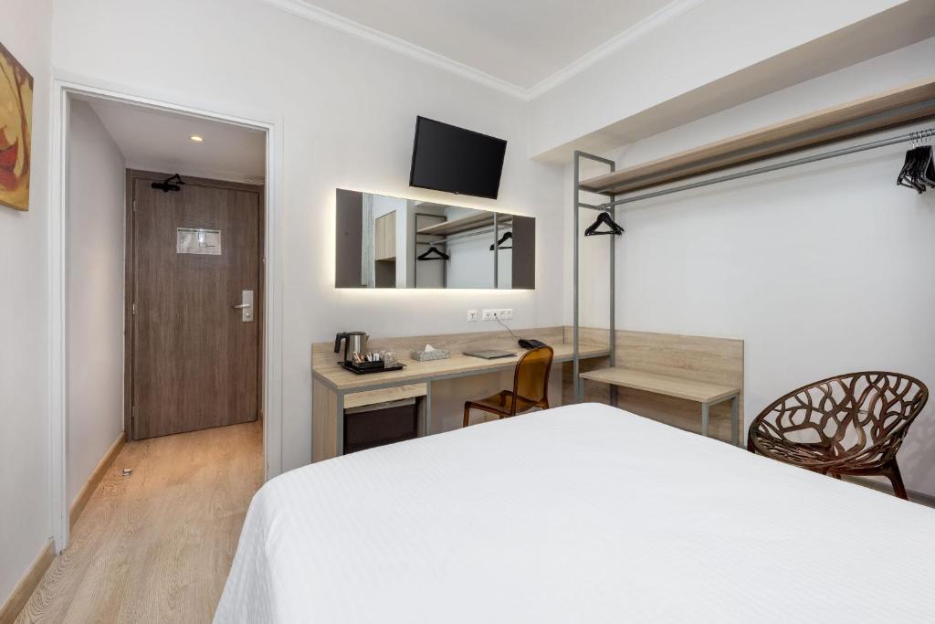 Posteľ alebo postele v izbe v ubytovaní Pan Hotel