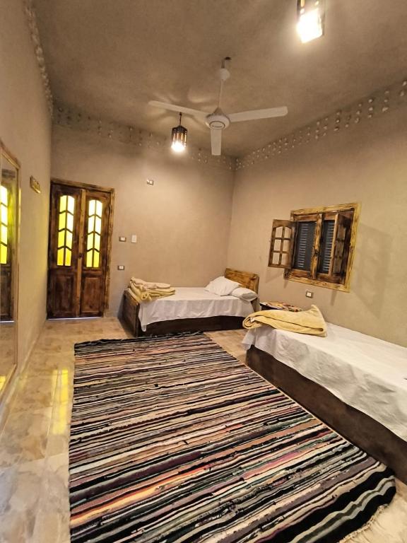 Letto o letti in una camera di انير انشال Enir Enshal