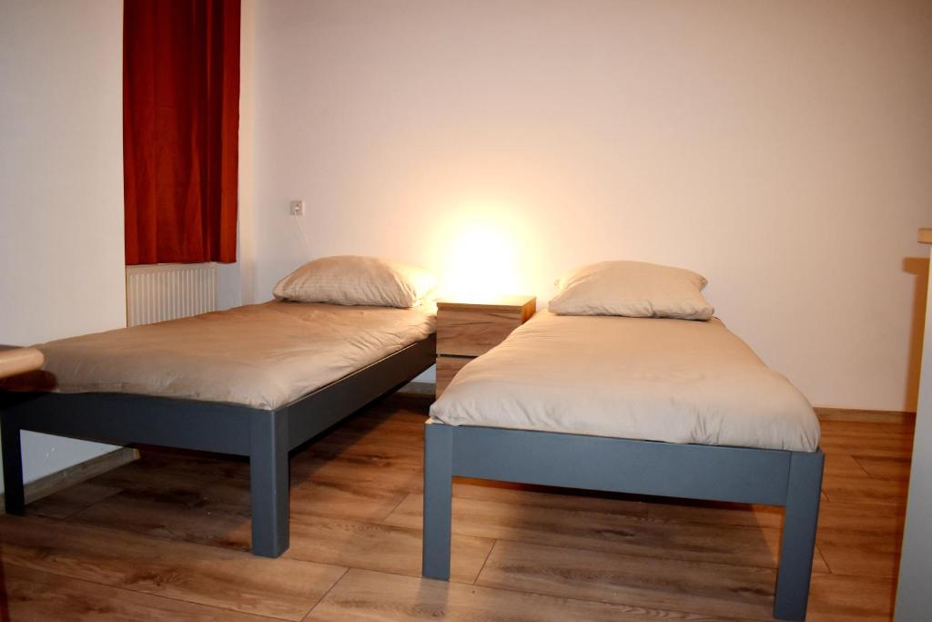 Postel nebo postele na pokoji v ubytování Hotel New Town