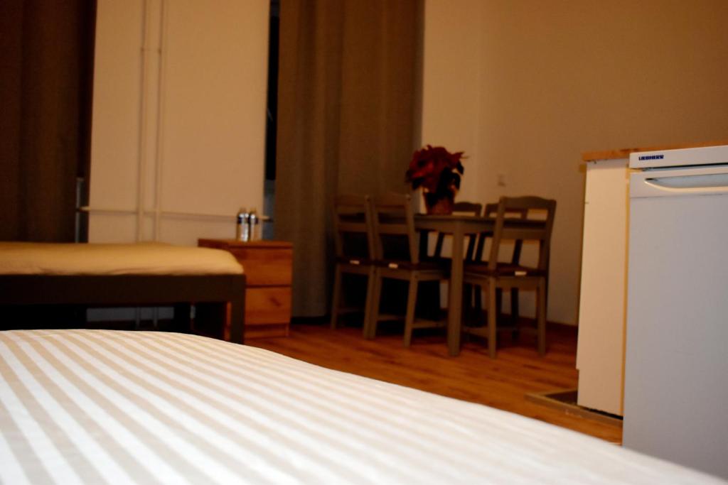 Postel nebo postele na pokoji v ubytování Hotel New Town