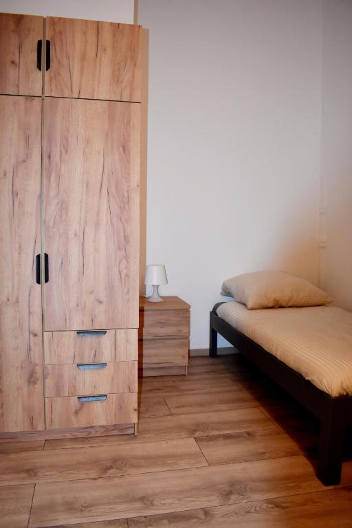 Postel nebo postele na pokoji v ubytování Hotel New Town