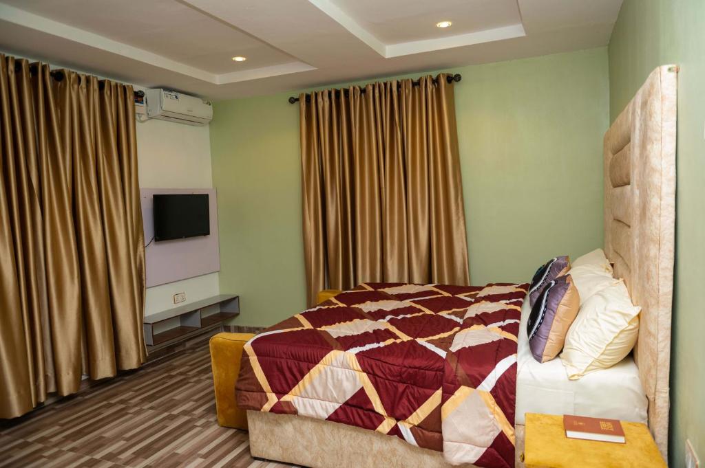 Postel nebo postele na pokoji v ubytování Goodis Apartments Ajah