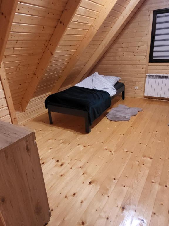 Postel nebo postele na pokoji v ubytování Domki Jagodna-Spalona 6D jacuzzi