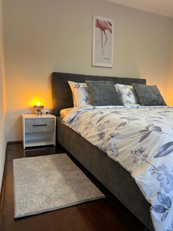 Postel nebo postele na pokoji v ubytování Apartman JV