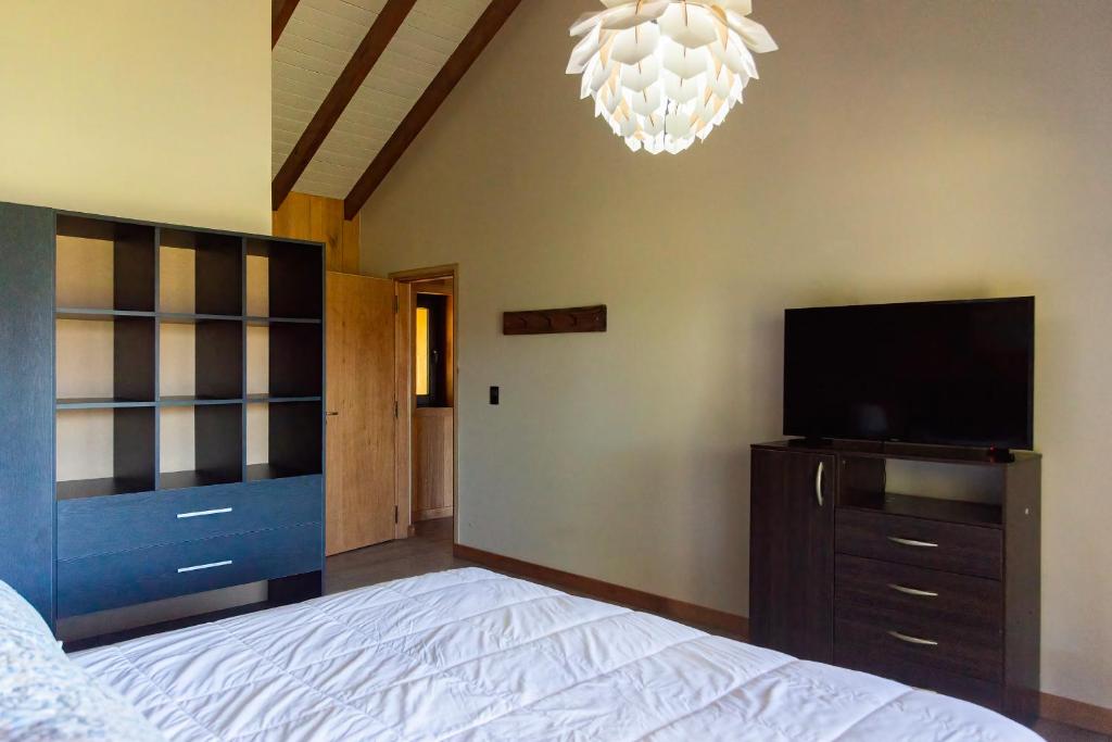 Postel nebo postele na pokoji v ubytování Catalina - Casa de Montaña