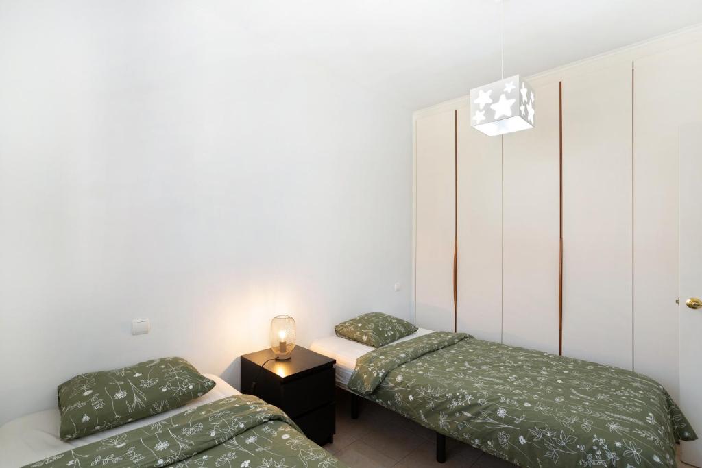 Postel nebo postele na pokoji v ubytování Sunset Villa Meloneras