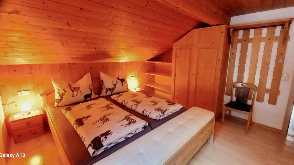 Postel nebo postele na pokoji v ubytování Haus Simma