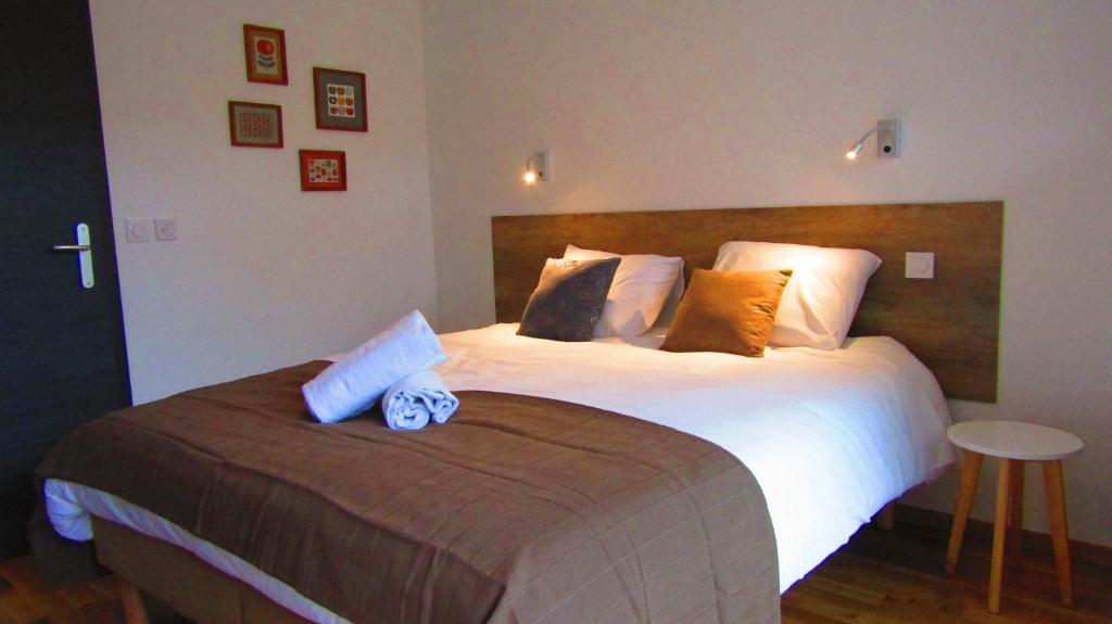 Postel nebo postele na pokoji v ubytování Appartement Semnoz - Vue Lac