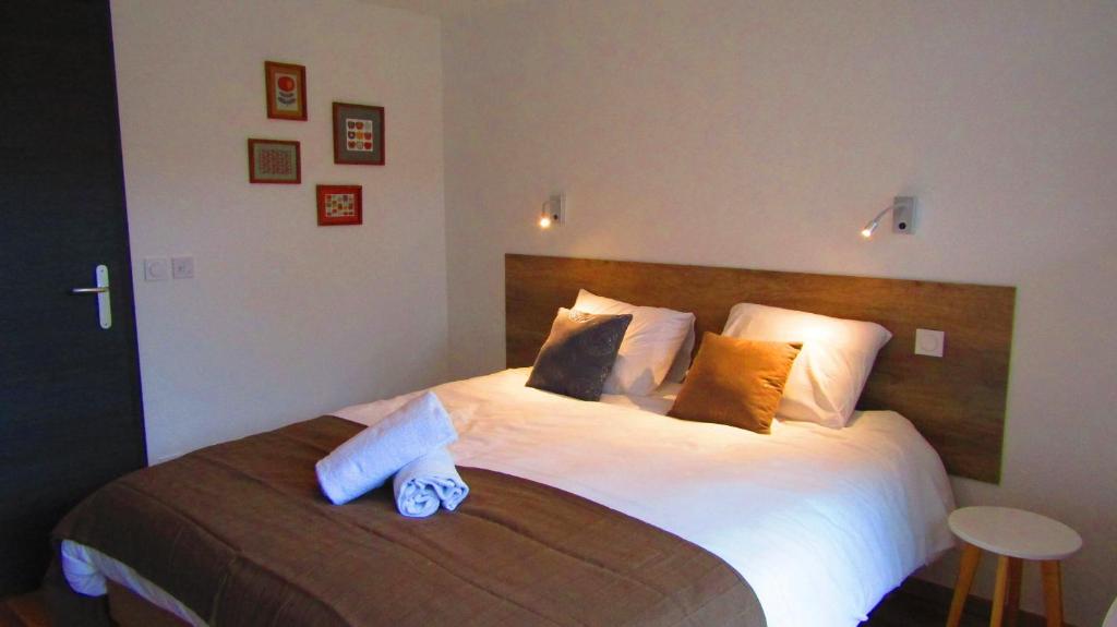 Postel nebo postele na pokoji v ubytování Appartement Semnoz - Vue Lac