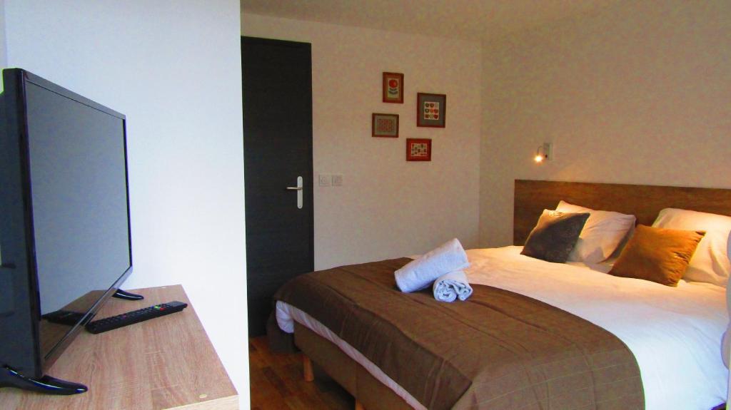 Postel nebo postele na pokoji v ubytování Appartement Semnoz - Vue Lac