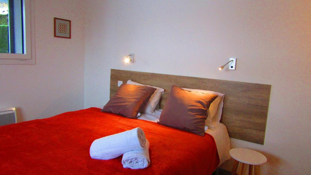 Postel nebo postele na pokoji v ubytování Appartement Semnoz - Vue Lac