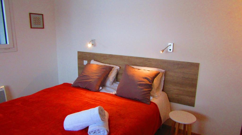 Postel nebo postele na pokoji v ubytování Appartement Semnoz - Vue Lac