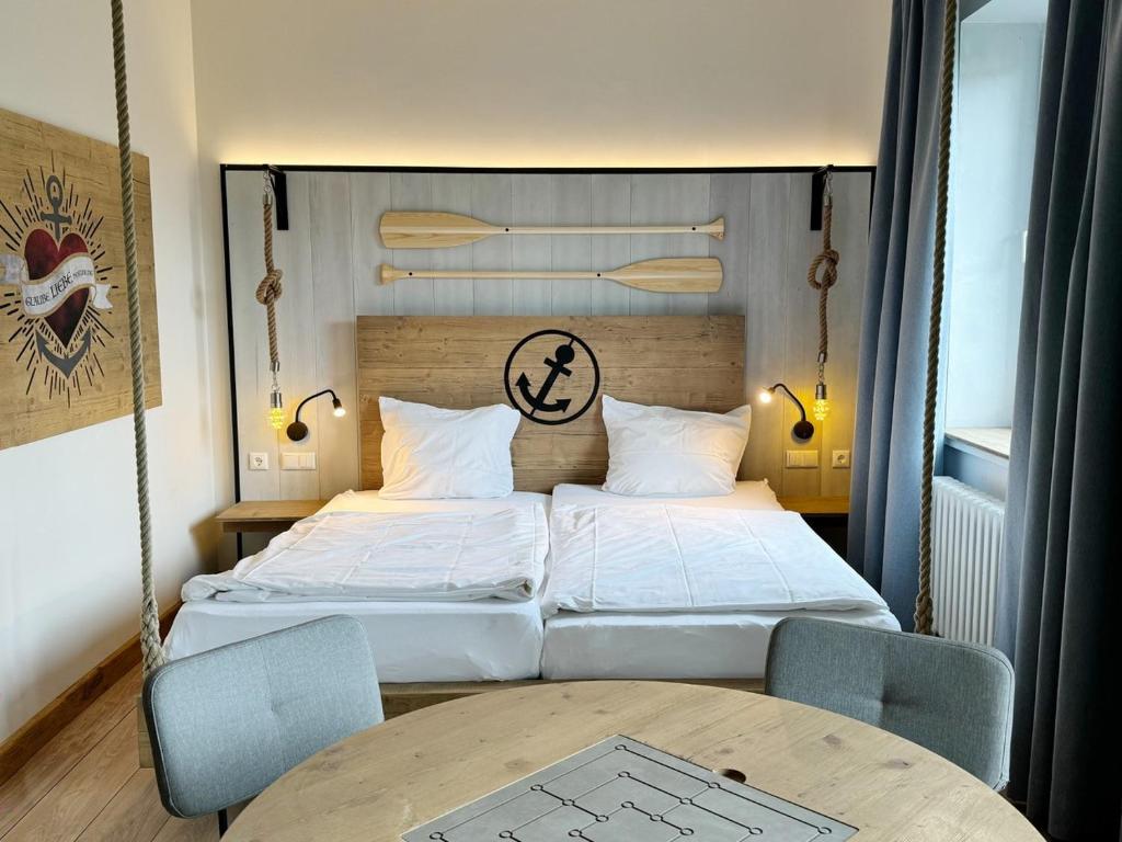 Postel nebo postele na pokoji v ubytování Wangerland Resort