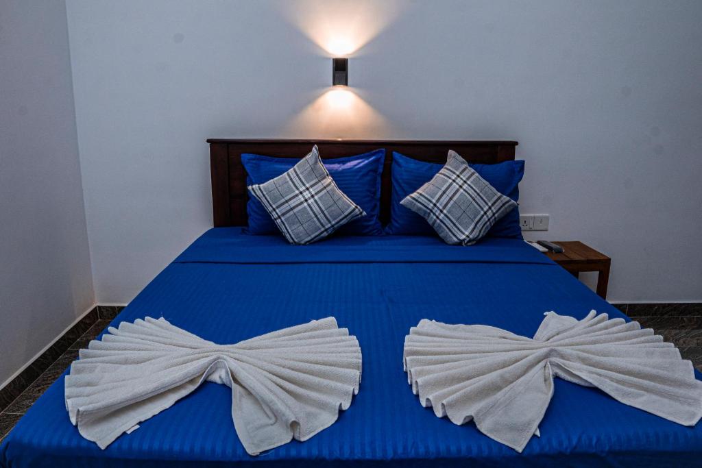 Postel nebo postele na pokoji v ubytování Theevanni Resort