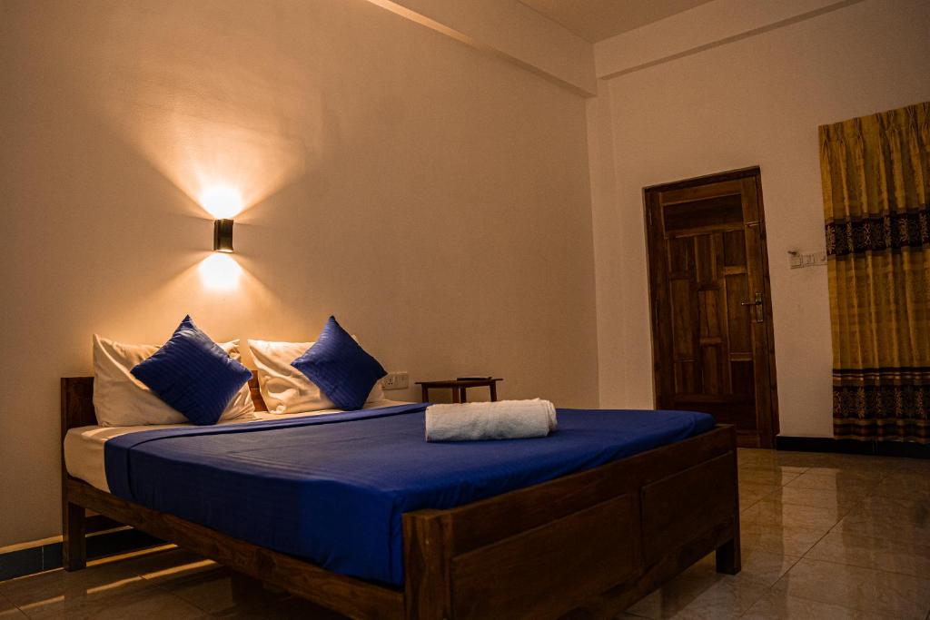 Postel nebo postele na pokoji v ubytování Theevanni Resort