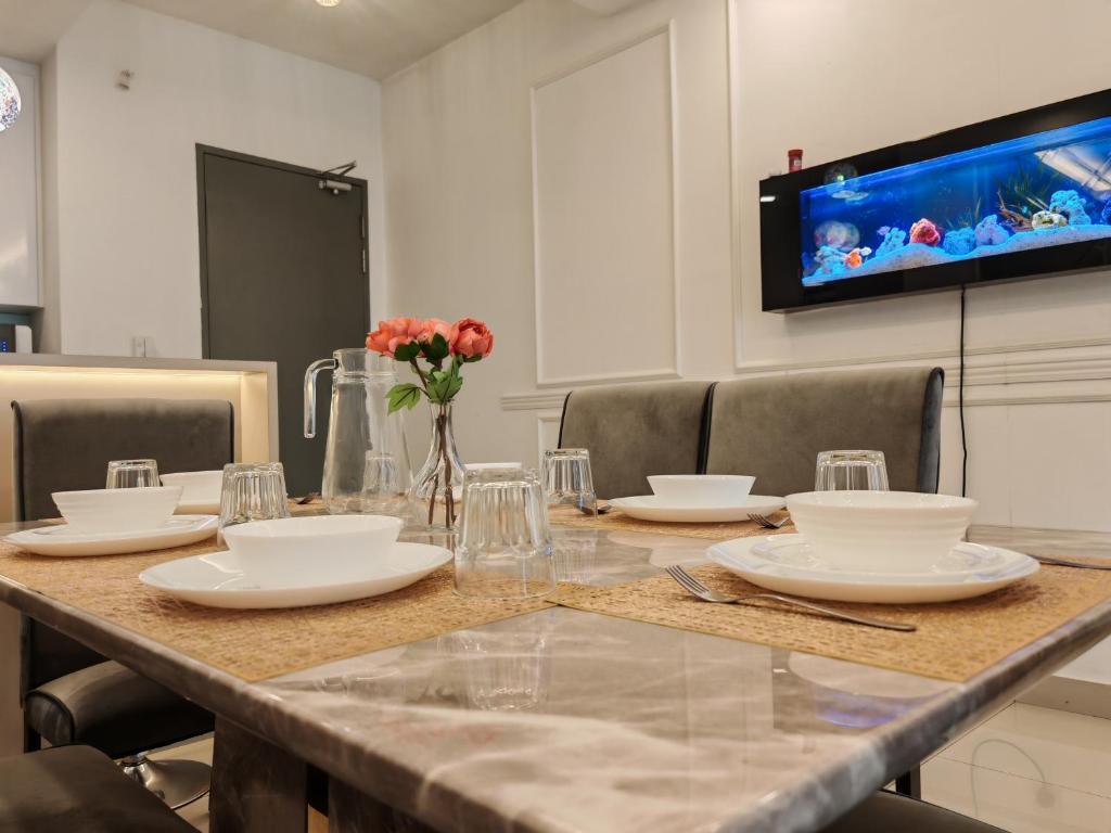 TV a/nebo společenská místnost v ubytování Near MMHE - 3 Bedrooms Homestay Meridin Bayvue Pasir Gudang