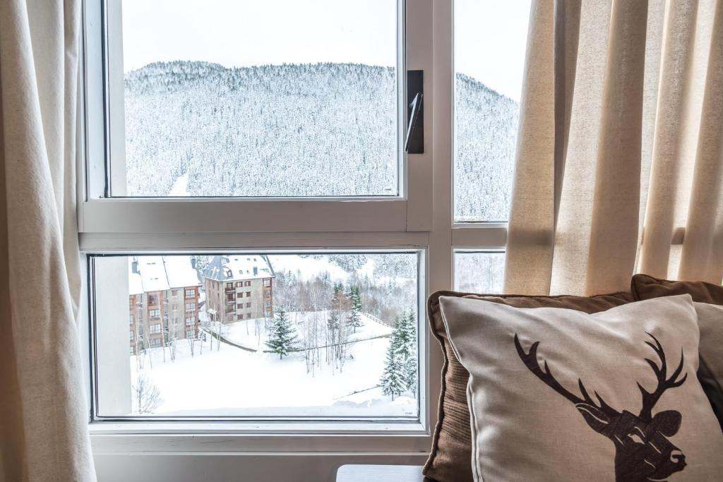 Nespecifikovaný výhled na hory nebo výhled na hory při pohledu z apartmánu