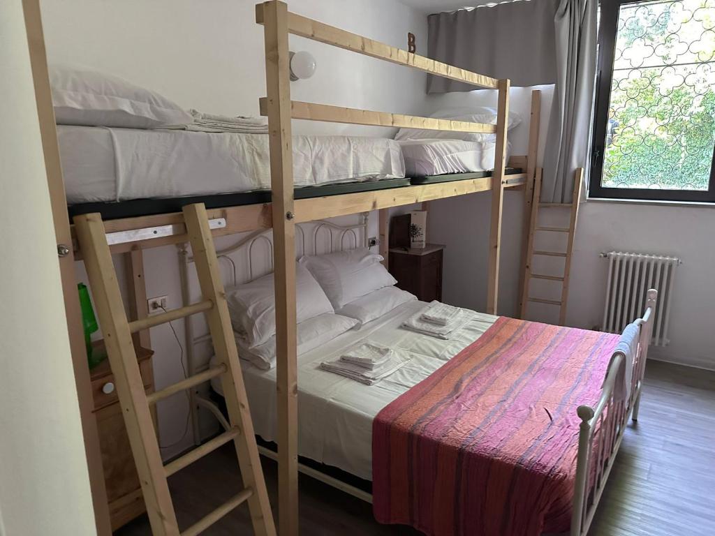 Posteľ alebo postele v izbe v ubytovaní Casa Michele - Alle Ninfee - by tourquoisevea