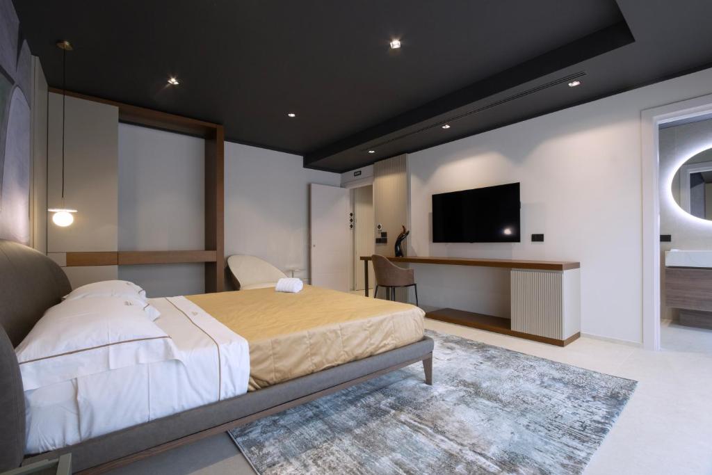 Postel nebo postele na pokoji v ubytování Villa Della Lupa Luxury Rooms