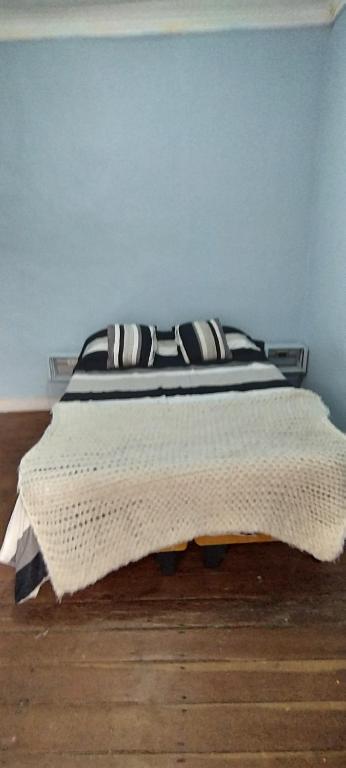 Postel nebo postele na pokoji v ubytování Hostal Perro Watón