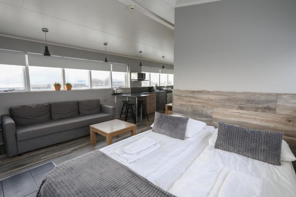 Postel nebo postele na pokoji v ubytování Skýjaborg Apartments
