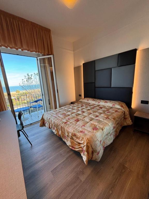 Postel nebo postele na pokoji v ubytování Hotel Cobalto