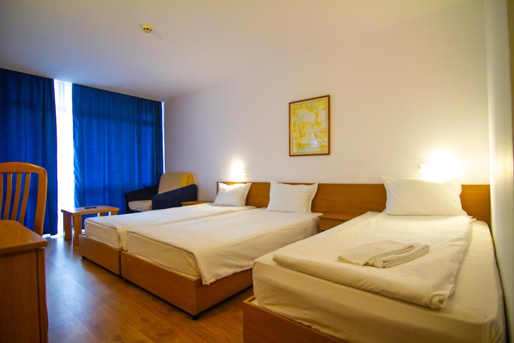 Postel nebo postele na pokoji v ubytování Hotel Opal - All Inclusive