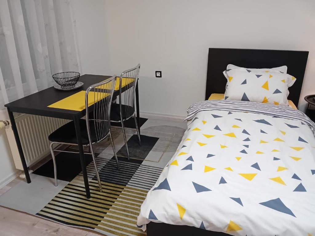 Postel nebo postele na pokoji v ubytování PRIMUS mini room
