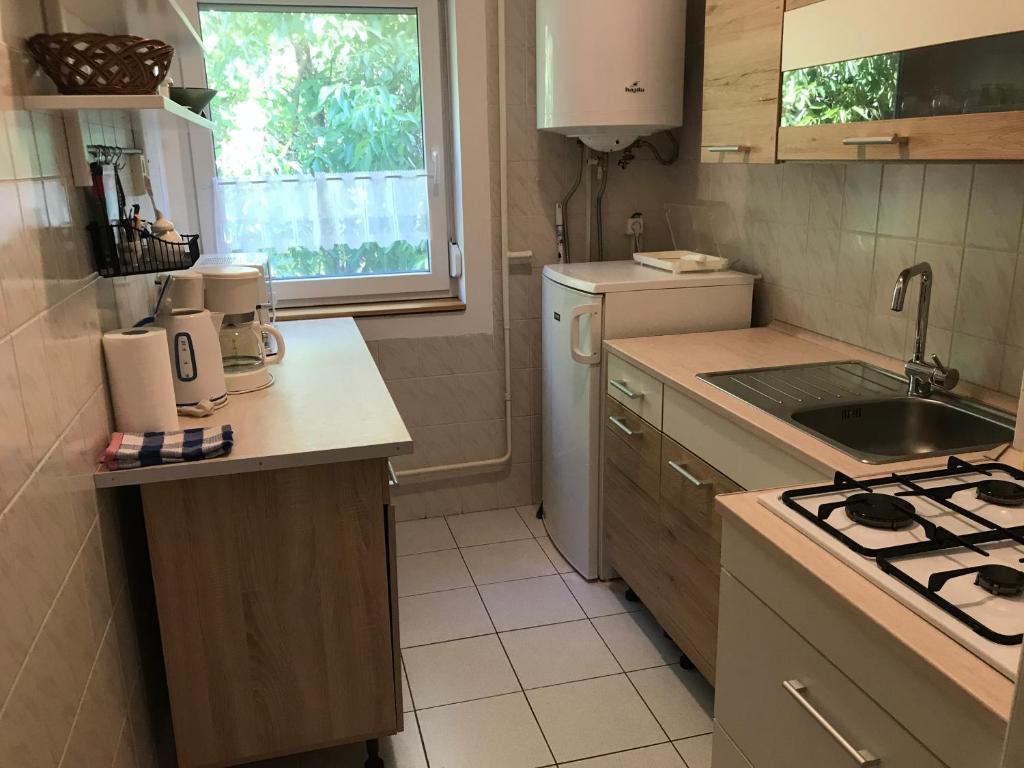Kuchyň nebo kuchyňský kout v ubytování Gabi Villa