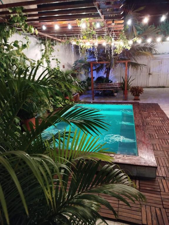 Bazén v ubytování HOSTAL LA BOQUILLA nebo v jeho okolí