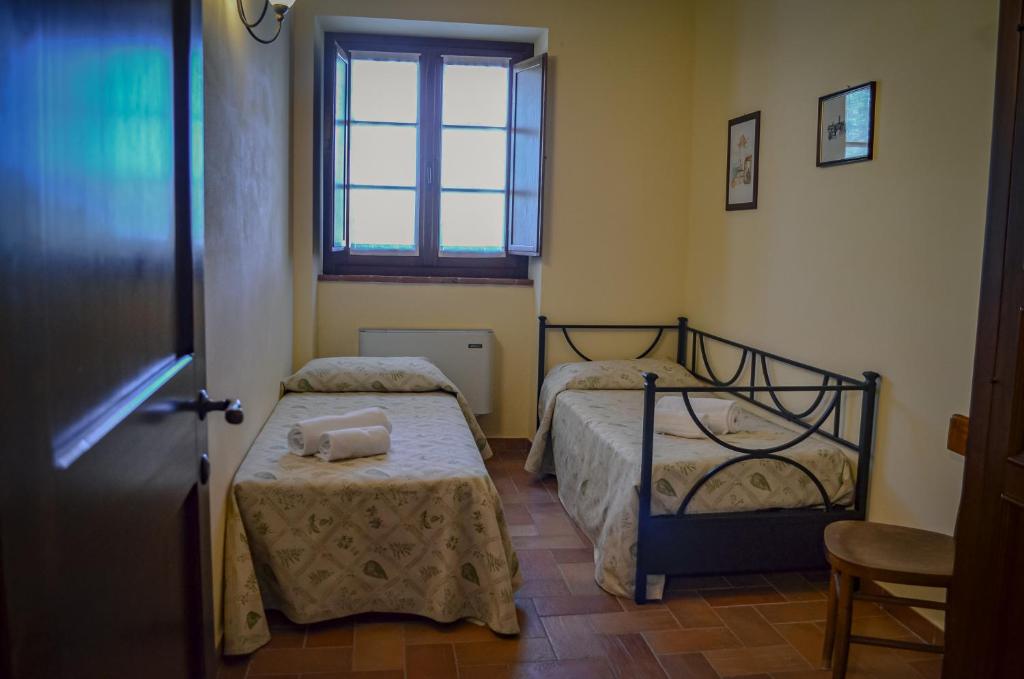 Postel nebo postele na pokoji v ubytování PanElios Borgo Vacanze