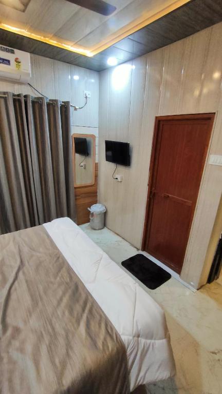 Postel nebo postele na pokoji v ubytování SK Residency