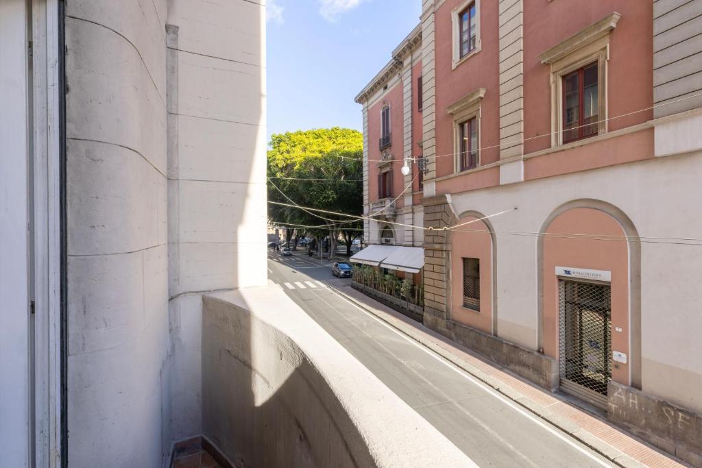 a view of an empty street from a building at Maddalena Rooms - Eja Sardinia in Cagliari