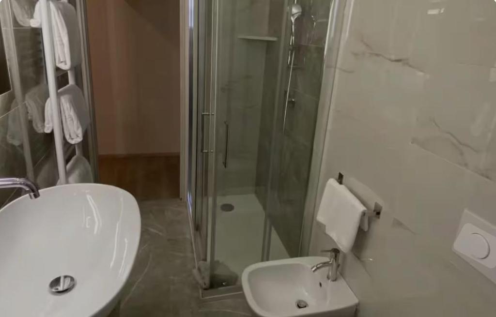 Koupelna v ubytování Hotel Napoleon