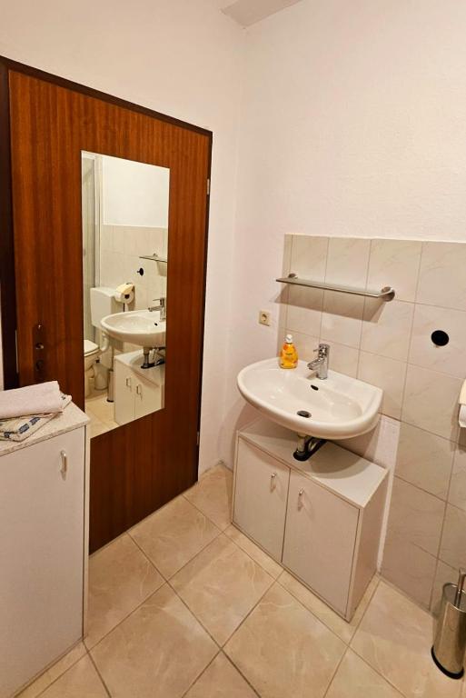 Koupelna v ubytování Monteurzimmer Siebenlehn