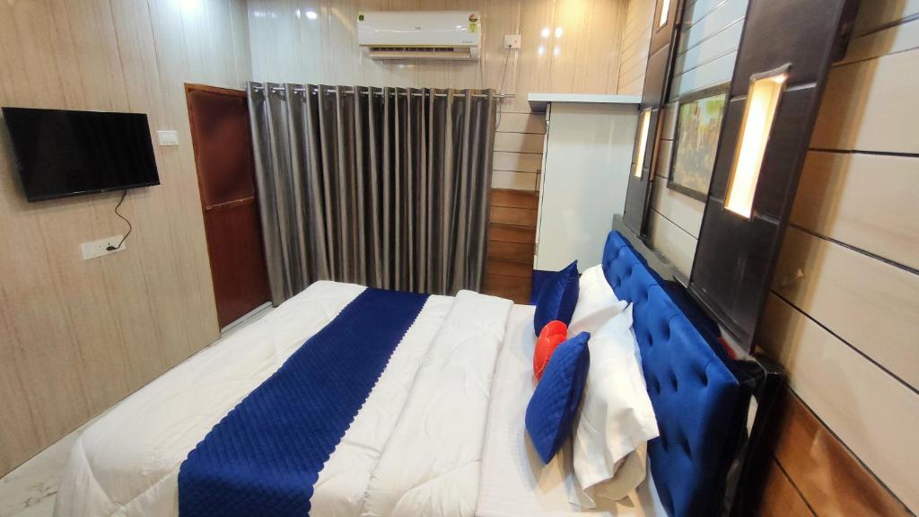 Postel nebo postele na pokoji v ubytování SK Residency