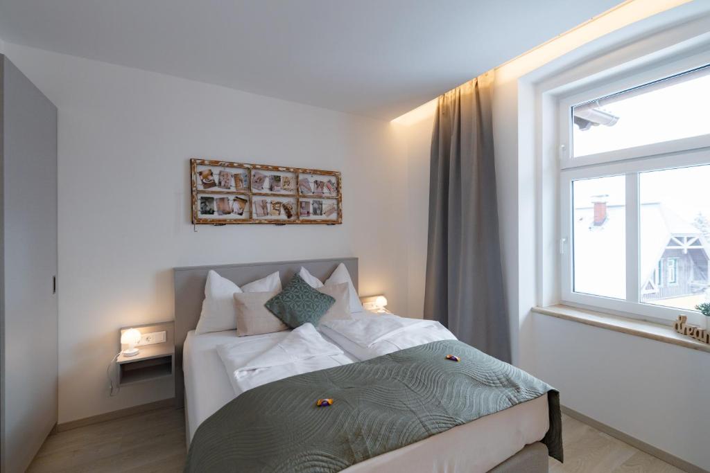 Postel nebo postele na pokoji v ubytování Apartment Mohr am Semmering