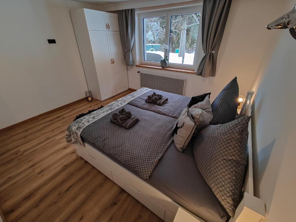 Postel nebo postele na pokoji v ubytování Apartment Anni im Haus Hintertal