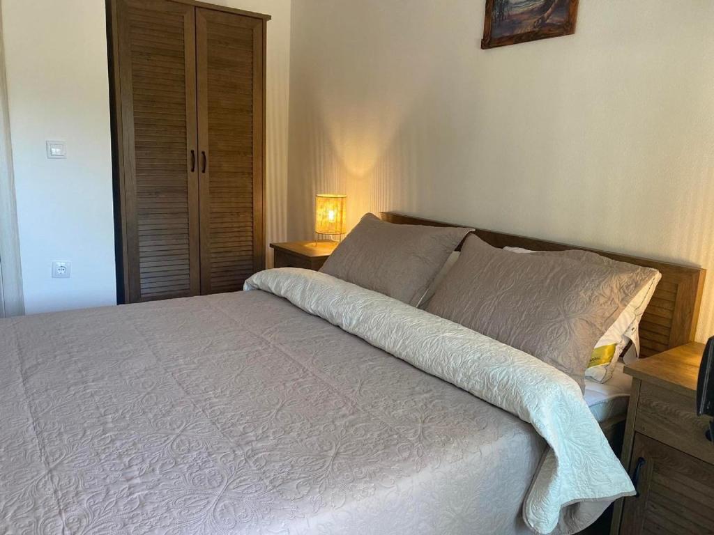 Postel nebo postele na pokoji v ubytování Sabina Bungalow - Long Beach