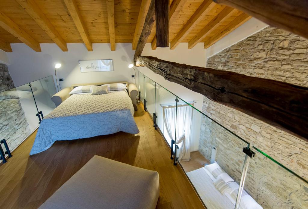 Postel nebo postele na pokoji v ubytování Relais Il Presidio