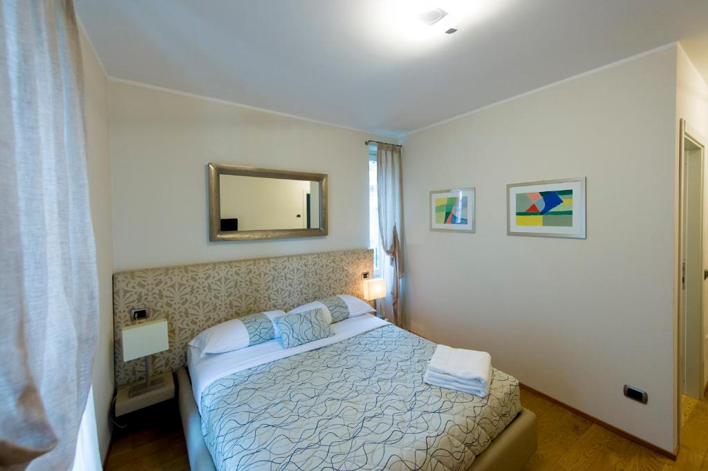 Postel nebo postele na pokoji v ubytování Relais Il Presidio